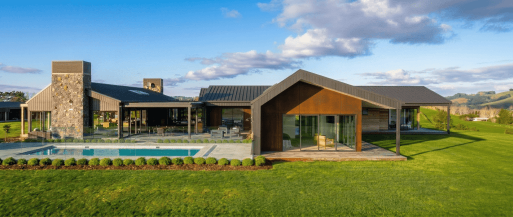 Luxury Matakana design featuring sumner stone and corten steel cladding with a pool