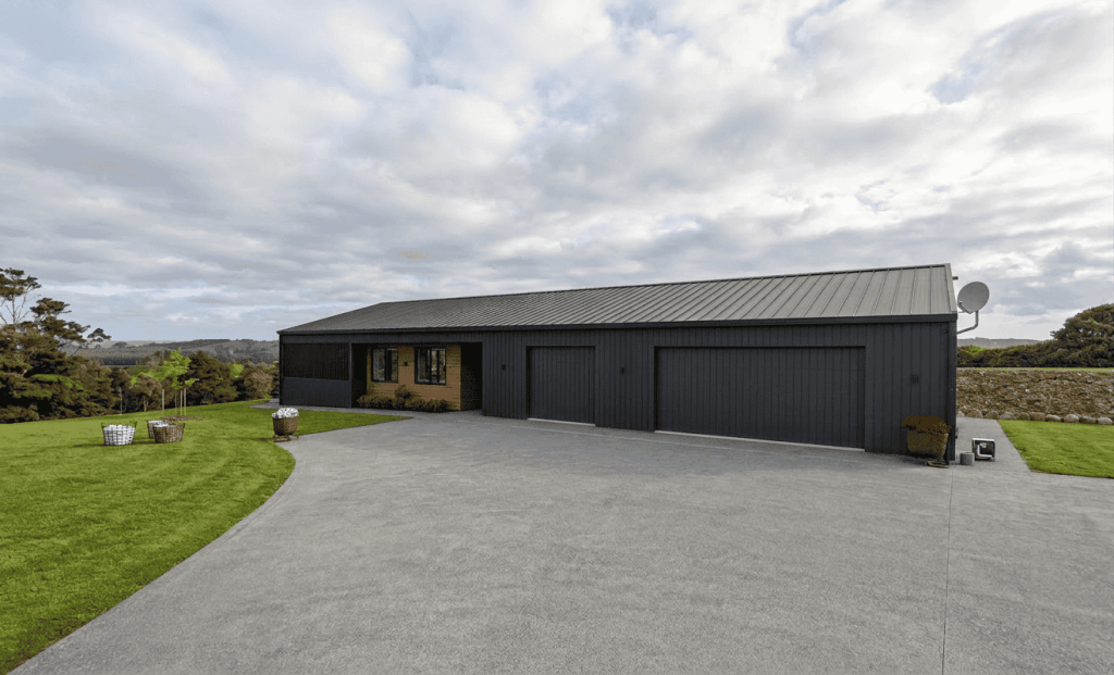 Minor dwelling and attached double garages in Matakana clad in James Hardie Linea Oblique and cedar weatherboards